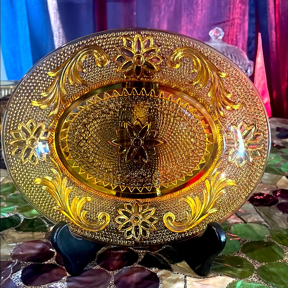 vintage Indiana Amber Glass oval plate, likely from the Tiara Sandwich pattern